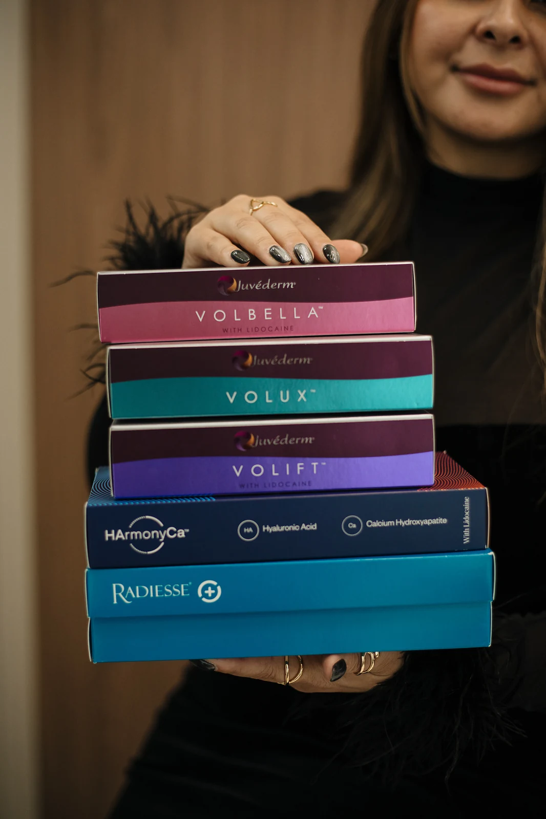 The hyaluronic acid fillers and biostimulators Dr. Sibaja works with — Volbella, Volux, Volift, HArmonyCa and Radiesse